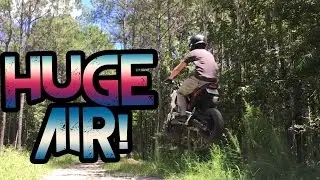 HONDA GROM AT A MOTORCROSS TRACK! HUGE AIR!