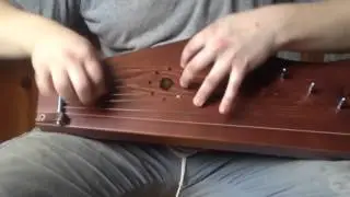 Игра на гуслях Комаринского