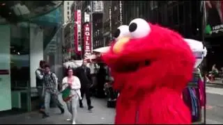 Cookie Monster, Elmo get in Times Square trouble