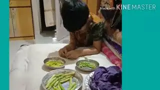 5 year kid peeling  green peas.