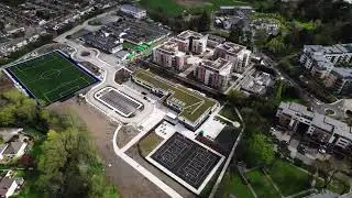 April 2023 - Ballinteer ETNS in spring: footpaths, green grass roofs, Wickham Way entrance