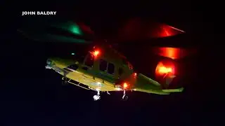 Dorset and Somerset Air Ambulance Taking off at Derriford Hospital at Night 10-6-18