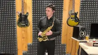 Луч солнца золотого на саксофоне