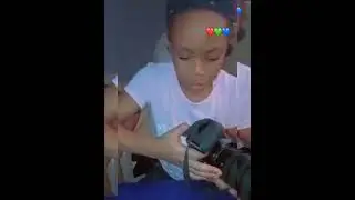 Watch the Little Girl Assembly the Nikon D5500 camera with all the accessories.