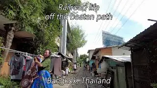 Railway path in Bangkok Thailand - walking through a shanty town