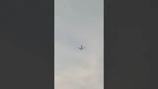 Plane flying over Mumbai (juhu) beach