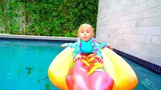 Alisa plays with new toys