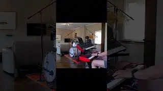 Slow tempo Free Funk grooves in a fusion style improvisation by a trio - Bass, Keys, Drums