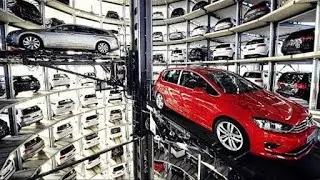 Робот подъёмник автомобилей.