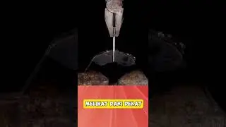 Melihat dari dekat saat memotong buah, permukaan pena, dan pembakaran sampul tali