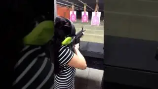 Jenn shooting a SCAR