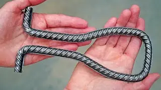 Vintage thing made of a piece of rebar and black metal!