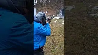 Shotgun side saddle (brass down) emergency reload. Winchester SXP