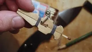 пистолет из прищепки.