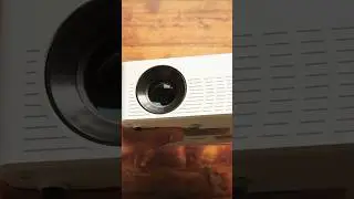 I tried a projector from Amazon that’s under $100 and I was super impressed by it.