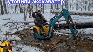 Прокладка кабеля в болоте с помощью миниэксковатора.