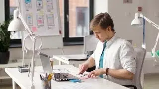 Ui Designer with Templates and Laptop at Office 3 Stock  | Videohive Project Templates