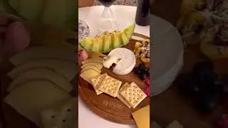 Charming cheese board in action: Vintorio 12" Round Magnetic Cheese Board