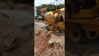 Cement mixer construction vehicle fells down in drainage