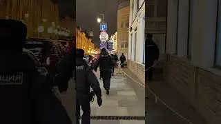 RUSSIAN POLICE arrest a guy for drunken misconduct