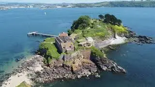 Drakes Island Plymouth Sound can look like a tropical island on deep blue Sea white sandy beaches ￼