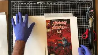 Advanced methods for comic book pressing and dent removal - Acclaim Maximum Carnage 1