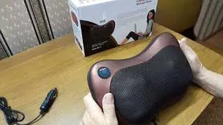 Акупрессура позвоночника с помощью массажера.