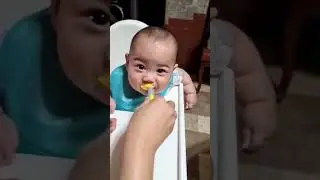 Baby Brix enjoying his first meal