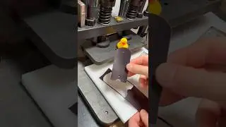 Punching out a ring holder #leathertok #leatherwork #edc #leatherasmr #leathergoods #leatherpunch
