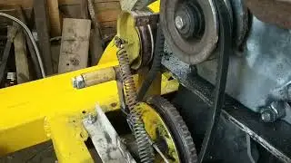 Cable clutch for a homemade mini tractor.
