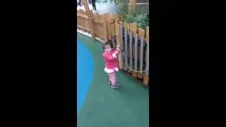 Baby Playing Xylophne at Playground