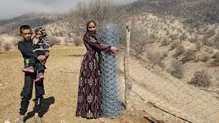 Nomadic Resilience: Pregnant Nomadic Woman Fences Field Alone in Husband's Absence 🌾