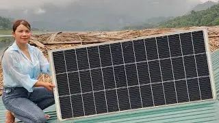 The girl moved solar panels to her new house and installed light bulbs for light.