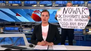 14.03.2022 во время программы Новости (ОРТ) вбежала девушка Марина Овсянникова с плакатом 2022 WSH