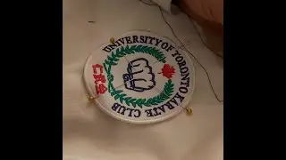 Sewing a patch onto a Karate Uniform