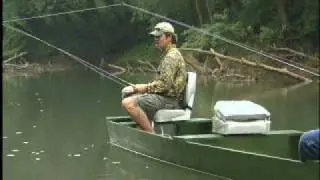 Flat Bottom Wooden Boats floating on the green river