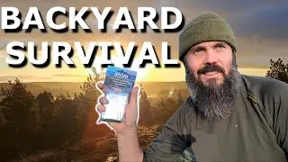 Backyard camping with space blanket lean to shelter and self feeding fire