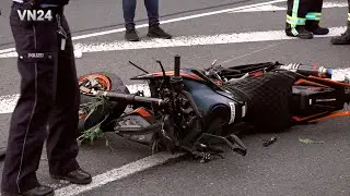 VN24 - Motorcycle skids into crash barrier - Rider is thrown off