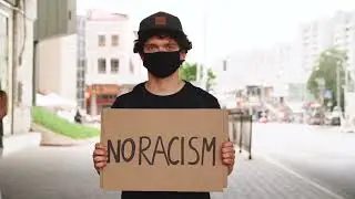 Copyright Free No Racism Banner Stock Footage | Racial Discrimination Royalty Free To Use