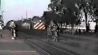 (**WARNING GRAPHIC**) Woman gets hit by a speeding Metra train led by BN EMD E9 # 9912 (Traingirl)