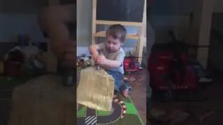 Baby hammering nails like a pro