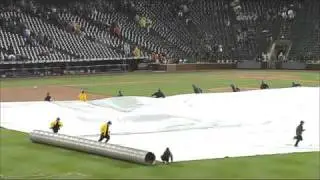2011/05/10 Grounds crew caught under tarp