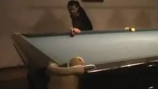 Юрий играет в бильярд