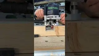 Cleaning out the bottom of the joint with a straight bit with top bearing 