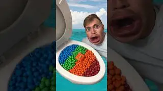 Eating M&Ms candy from Ocean Toilet