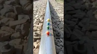 Train 🚂 vs bolls colorful candy  🍬🤓🚈 #train #shorts #viral #candy #youtubeshorts #gujranwalaskill