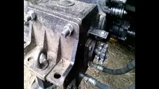 Motor tractor. Chain tensioner of the transition gearbox.