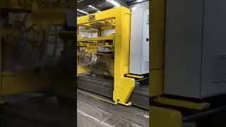 Sawing machine for cutting hollow core slabs
