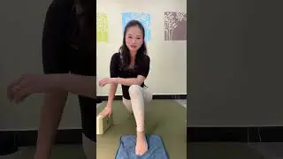 A woman practicing yoga wearing nylon socks