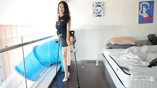 Ayla: Sak Amputee Girl wearing stockings plays at an amusement park 
